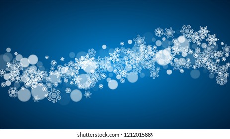 Snowflakes falling on blue background. Christmas and New Year horizontal theme. Frosty falling snowflakes for banners, gift card, party invitation, compliments and special business offer