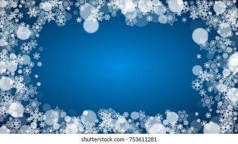 Snowflakes falling on blue background. Christmas and New Year horizontal theme. Frosty falling snowflakes for banners, gift card, party invitation, compliments and special business offer