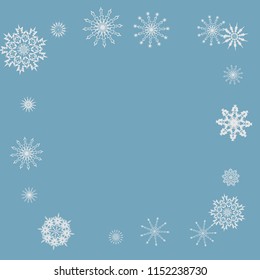 Snowflakes falling on a blue sky background. Winter vector background. The effect of decorating snowflakes. The winter vacation. Well suited for a Christmas card, banner or poster. EPS 10
