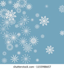 Snowflakes falling on a blue sky background. Winter vector background. The effect of decorating snowflakes. The winter vacation. Well suited for a Christmas card, banner or poster. EPS 10