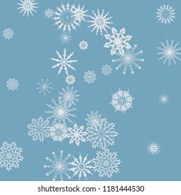 Snowflakes falling on a blue sky background. Winter vector background. The effect of decorating snowflakes. The winter vacation. Well suited for a Christmas card, banner or poster. EPS 10