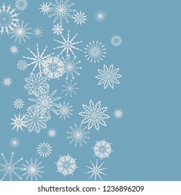 Snowflakes falling on a blue sky background. Winter vector background. The effect of decorating snowflakes. The winter vacation. Well suited for a Christmas card, banner or poster. EPS 10