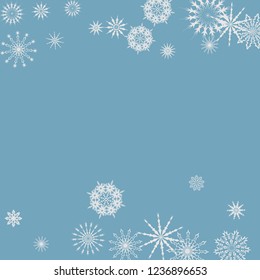 Snowflakes falling on a blue sky background. Winter vector background. The effect of decorating snowflakes. The winter vacation. Well suited for a Christmas card, banner or poster. EPS 10