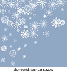 Snowflakes falling on a blue sky background. Winter vector background. The effect of decorating snowflakes. The winter vacation. Well suited for a Christmas card, banner or poster. EPS 10