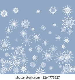 Snowflakes falling on a blue sky background. Winter vector background. The effect of decorating snowflakes. The winter vacation. Well suited for a Christmas card, banner or poster. EPS 10