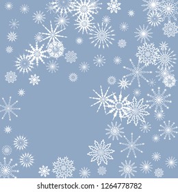 Snowflakes falling on a blue sky background. Winter vector background. The effect of decorating snowflakes. The winter vacation. Well suited for a Christmas card, banner or poster. EPS 10