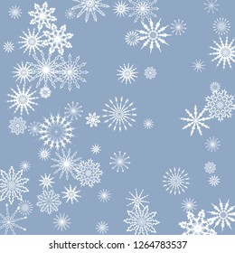 Snowflakes falling on a blue sky background. Winter vector background. The effect of decorating snowflakes. The winter vacation. Well suited for a Christmas card, banner or poster. EPS 10