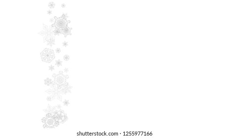 Snowflakes falling on white background. Horizontal Christmas and Happy New Year theme. Silver falling snowflakes for banner, gift card, party invitation, partner compliment and special business offers