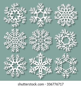 Snowflakes flat icon set collection. Nine carved varied snowflakes with long shadows. Illustration for Christmas and New Year design.