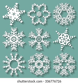 Snowflakes flat icon set collection. Nine carved varied snowflakes with long shadows. Illustration for Christmas and New Year design.