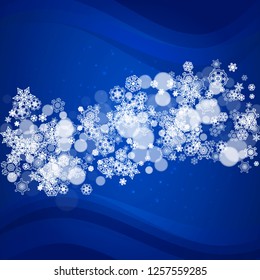 Snowflakes frame on blue background with sparkles. Merry Christmas and Happy New Year. Falling snowflakes frame for banners, gift cards, party invitation, partner compliment and special business offer