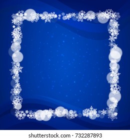 Snowflakes frame on blue background with sparkles. Merry Christmas and Happy New Year. Falling snowflakes frame for banners, gift cards, party invitation, partner compliment and special business offer