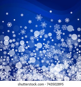 Snowflakes frame on blue background with sparkles. Merry Christmas and Happy New Year. Falling snowflakes frame for banners, gift cards, party invitation, partner compliment and special business offer