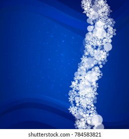Snowflakes frame on blue background with sparkles. Merry Christmas and Happy New Year. Falling snowflakes frame for banners, gift cards, party invitation, partner compliment and special business offer