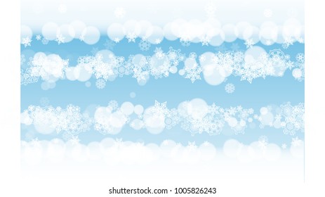 Snowflakes frame on horizontal blue winter background with sparkles. Merry Christmas and Happy New Year. Falling snowflakes frame for banners, gift cards, party invitation and special business offer