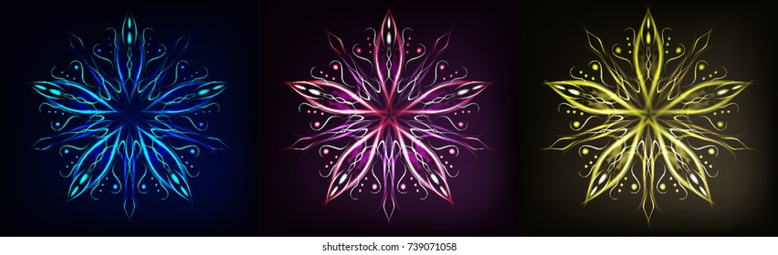 Snowflakes glowing colored on a dark background