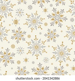 Snowflakes gold and silver seamless pattern for Christmas packaging, textiles, wallpaper vector illustration.