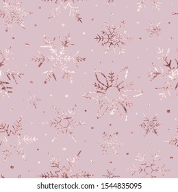Snowflakes golden glitter. Marble texture rose gold. Winter background. Elegant seamless pattern. Beautiful delicate snow backdrop. Falling random snowflakes for winter design. Scatter snowflakes