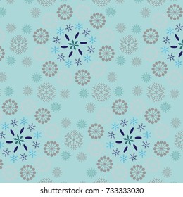 Snowflakes in green and grey. seamless vector geometric pattern of various shapes of snowflakes arranged in floral structure over a pale green background