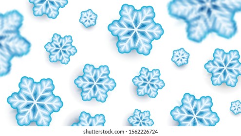 Snowflakes illustration pattern on white backdrop with focus blur