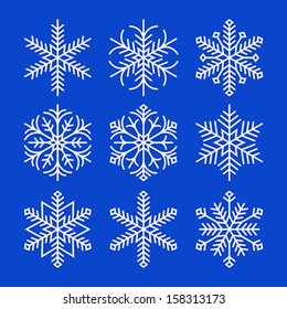 Snowflakes isolated on blue background