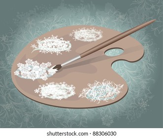 Snowflakes on the art palette and paintbrush. Background with winter pattern
