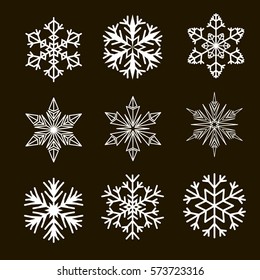 Snowflakes on black background. Vector illustration.