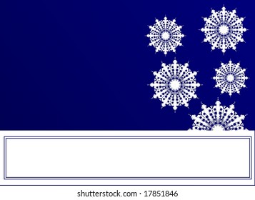 Snowflakes on blue background. Copy space included.