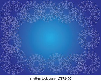 Snowflakes on blue background. Copy space included.
