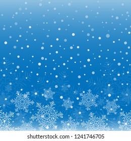Snowflakes on blue background. Holiday greeting and celebration in Winter season.