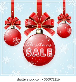 Snowflakes on blue background, red balls with bow and Inscription Christmas sale, illustration.