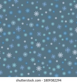 snowflakes on a blue background seamless pattern