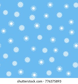 Snowflakes on blue background. Seamless pattern with snowflakes