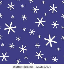 Snowflakes on a dark blue background. Seamless winter pattern