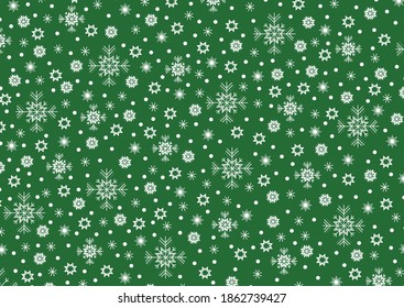 Copos de nieve en un fondo verde