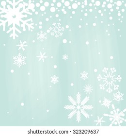 Snowflakes on green background