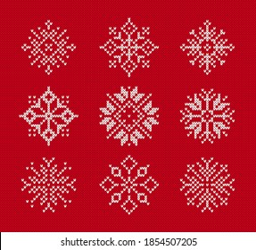 Snowflakes on knitted pattern. Vector illustration. Set of Christmas winter symbols on red seamless background. Sweater knit texture.