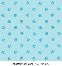 Snowflakes on light blue background. Seamless pattern with snowflakes. 