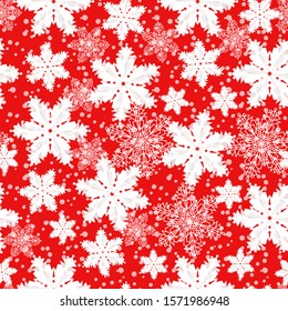 Snowflakes on a seamless red background. Decorative greeting card happy New year and merry Christmas.