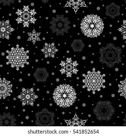 Snowflakes pattern. Flat design of gray snowflakes isolated on black background. Vector snowflakes background. Snowflake seamless pattern.