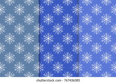 Snowflakes patterns. Set of blue seamless backgrounds with christmas elements for wallpapers and textile. Vector illustration