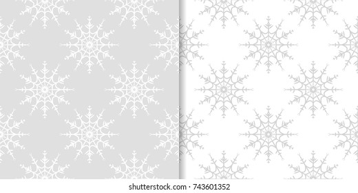Snowflakes patterns. Set of gray seamless background with christmas elements for wallpapers and textile. Vector illustration