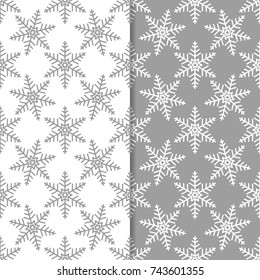 Snowflakes patterns. Set of gray seamless background with christmas elements for wallpapers and textile. Vector illustration