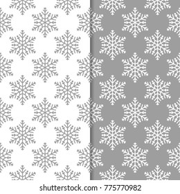 Snowflakes patterns. Set of gray seamless background with christmas elements for wallpapers and textile. Vector illustration