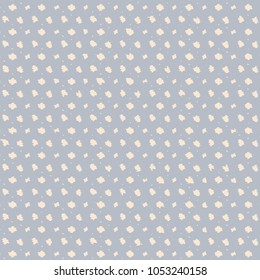 Snowflakes or polka dots on light blue background, pattern for textile fabrics or wallpaper. Vector illustration.