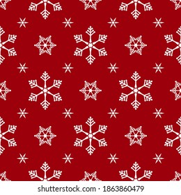 Los copos de nieve hacen un patrón de navidad sin fisuras. Copos de nieve blancos de fondo rojo. Papel envuelto, regalo, tarjeta de Navidad, tela, decoración