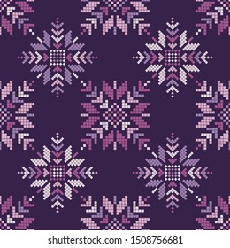 Snowflakes. Seamless knitted pattern. A warm sweater. Knitted mosaic. Can be used for wallpaper, textile, invitation card, wrapping, web page background.
