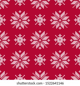 Snowflakes. Seamless knitted pattern. A warm sweater. Can be used for wallpaper, textile, invitation card, wrapping, web page background.