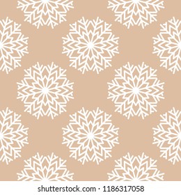 Snowflakes. Seamless pattern. Brown beige winter ornament. Background for textile and wallpapers