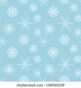 Snowflakes. Seamless pattern. Navy blue and white winter ornament. Background for textile and wallpapers